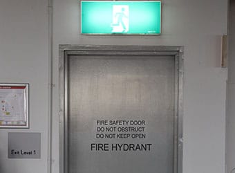 Fire doors and penetrations which reduce the spread of fire and smoke